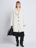 Front image of model wearing Ruth Coat In Knit Outerwear in ivory