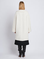 Back image of model wearing Ruth Coat In Knit Outerwear in ivory
