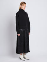 Side image of model wearing Alma Sweater In Lofty Eco Cashmere in black