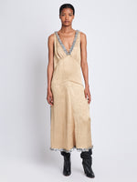 Front image of model wearing Mira Dress In Embroidered Crushed Satin in gold