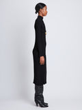 Side full length image of model wearing Midweight Viscose Rib Knit Dress in BLACK