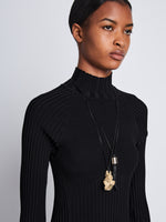 Detail image of model wearing Midweight Viscose Rib Knit Dress in BLACK