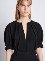 Detail image of model wearing Georgia Top In Matte Viscose Crepe in black