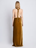 Back image of model wearing Faye Backless Twist Back Dress In Velvet in ochre