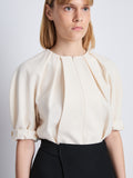 Detail image of model wearing Georgia Top In Matte Viscose Crepe in ecru