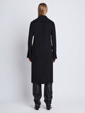 Back image of model wearing Louise Coat In Wool Cashmere in black