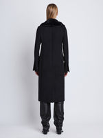 Back image of model wearing Louise Coat With Shearling Collar In Wool Cashmere in black
