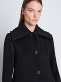 Detail image of model wearing Louise Coat In Wool Cashmere in black