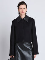 Cropped front image of model wearing Brigdet Cropped Jacket with Leather Collar in BLACK with collar
