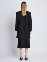 Back full length image of model wearing Henri Coat in BLACK