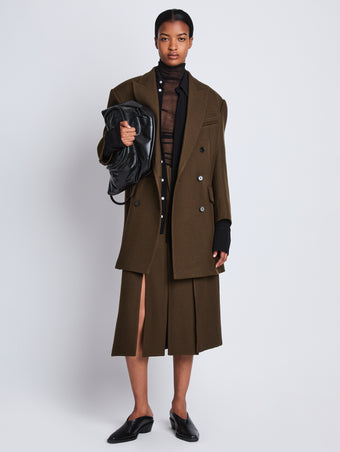 Front full length image of model wearing Henri Coat in DARK LODEN