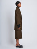 Side full length image of model wearing Henri Coat in DARK LODEN