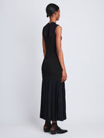 Back full length image of model wearing Niki Dress in NAVY