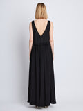 Back full length image of model wearing Lynda Dress In Textured Marocaine With Boucle in BLACK