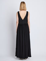 Back full length image of model wearing Lynda Dress In Textured Marocaine With Boucle in BLACK