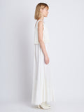 Side full length image of model wearing Lynda Dress In Textured Marocaine With Boucle in OFF WHITE