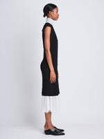 Side full length image of model wearing Mary Dress in BLACK