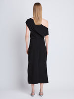 Back full length image of model wearing Rosa Off The Shoulder Dress in BLACK