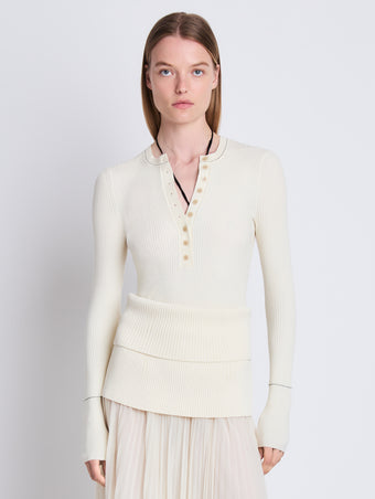 Front cropped image of model wearing Agnes Henley Sweater in IVORY