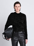 Cropped front image of model wearing Patti Sweater in Brushed Mohair in black