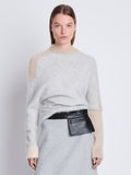 Front cropped image of model wearing Patti Sweater in LIGHT GREY MULTI