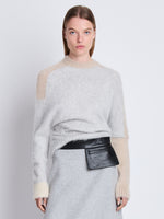 Front cropped image of model wearing Patti Sweater in LIGHT GREY MULTI