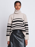 Front cropped image of model wearing Sandra Turtleneck In Striped Doubleface Cashmere in OATMEAL MULTI