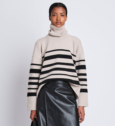 Front cropped image of model wearing Sandra Turtleneck In Striped Doubleface Cashmere in OATMEAL MULTI