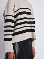 Detail image of model wearing Sandra Turtleneck In Striped Doubleface Cashmere in OATMEAL MULTI