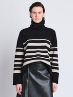 Front cropped image of model wearing Sandra Turtleneck In Striped Doubleface Cashmere in BLACK MULTI