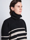 Detail image of model wearing Sandra Turtleneck In Striped Doubleface Cashmere in BLACK MULTI