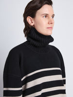 Detail image of model wearing Sandra Turtleneck In Striped Doubleface Cashmere in BLACK MULTI