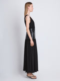 Side full length image of model wearing Viviane Dress in BLACK