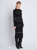 Side full length image of model wearing Rachel Dress in BLACK MULTI