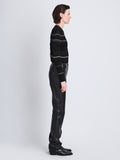 Side full length image of model wearing Judy Sweater in BLACK MULTI