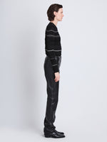 Side full length image of model wearing Judy Sweater in BLACK MULTI