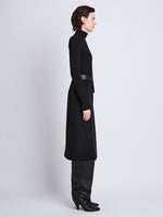 Side full length image of model wearing Claude Sweater in BLACK