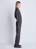 Side full length image of model wearing Barbara Pant In Melange Wool in GREY MELANGE