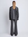 Back full length image of model wearing Barbara Pant In Melange Wool in GREY MELANGE