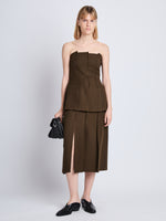 Front full length image of model wearing Corinne Strapless Top in DARK LODEN