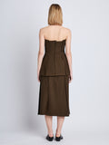 Back full length image of model wearing Corinne Strapless Top in DARK LODEN