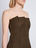 Detail image of model wearing Corinne Strapless Top in DARK LODEN