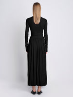 Back full length image of model wearing Meret Dress in BLACK