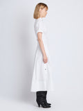 Side full length image of model wearing Tracey Dress in WHITE