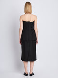Back full length image of model wearing Diane Skirt in BLACK