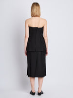 Back full length image of model wearing Diane Skirt in BLACK