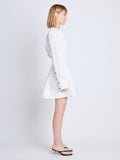 Side full length image of model wearing Eileen Dress in WHITE