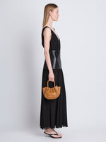 Image of model wearing Extra Small Ruched Tote in COGNAC