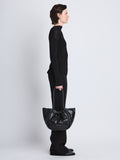 Image of model wearing Large Puffy Nappa Ruched Tote in BLACK