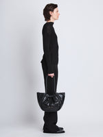 Image of model wearing Large Puffy Nappa Ruched Tote in BLACK